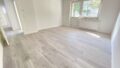 Wohnzimmer mit Balkon