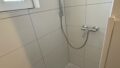 Modernisiertes Tageslichtbad mit Dusche