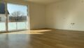 Wohnzimmer mit offener Küche