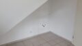 Einblick Wohnzimmer mit offenem Küchenbereich Bild 5